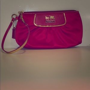 Gold and pink coach bag